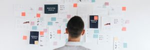 A casual business man looking at a marketing plan